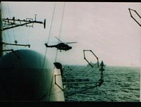 tn_Sea Skua armed Lynx SS Canberra astern